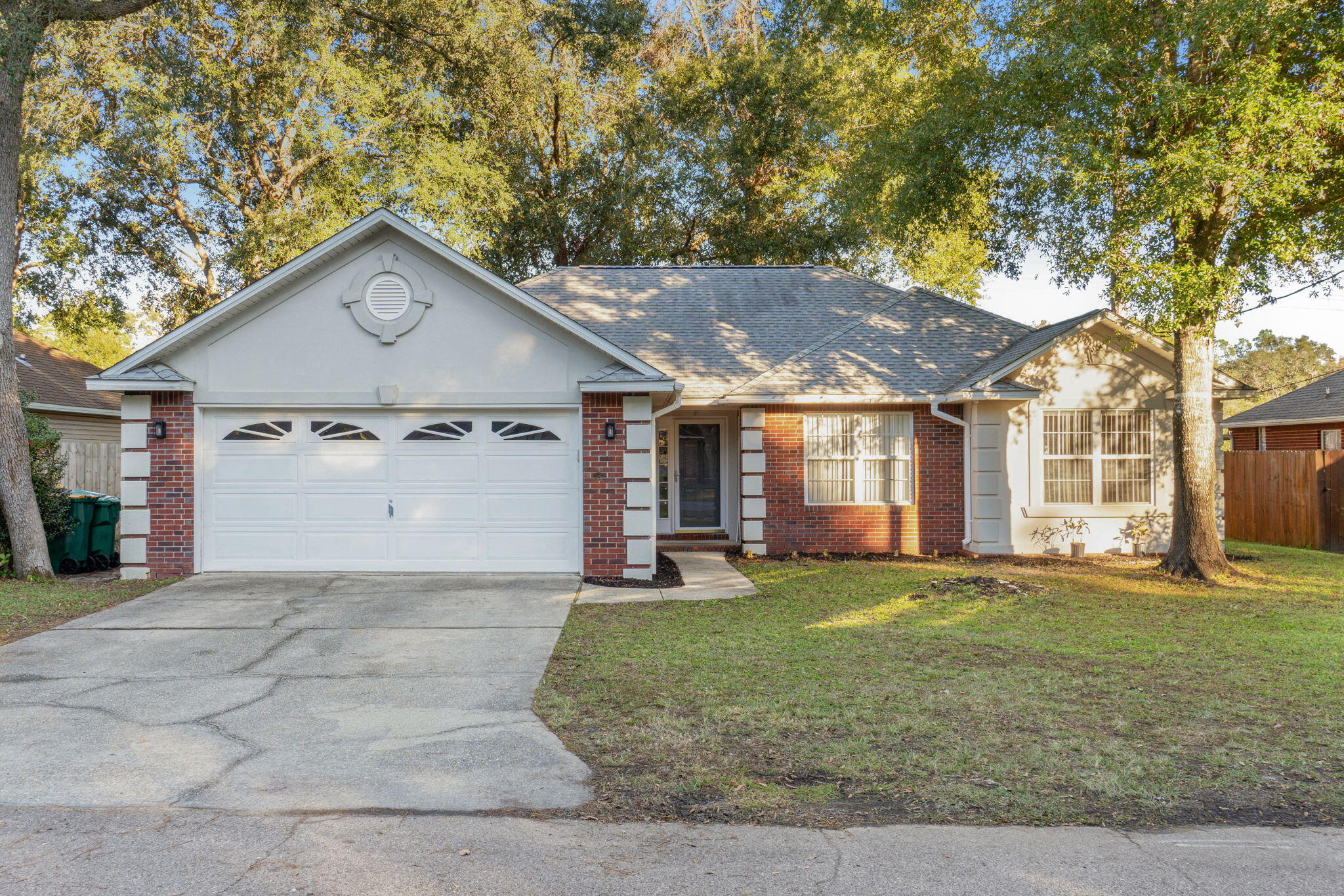 This charming 3-bedroom, 2-bathroom home is located on the sought-after Southside of Crestview, offering easy commutes to Duke Field, Eglin AFB, and quick access to I-10. Situated on 0.42 acres, the property features a screened-in back porch overlooking a fenced in yard with mature trees, perfect for relaxing or entertaining. A 10 x 12 shed on a concrete slab provides convenient storage for lawn equipment and more. Notable updates include a new roof and water heater, both replaced in 2019, and its county zoning means lower taxes. Don't miss the opportunity to own this inviting home in a prime location--schedule your showing today!