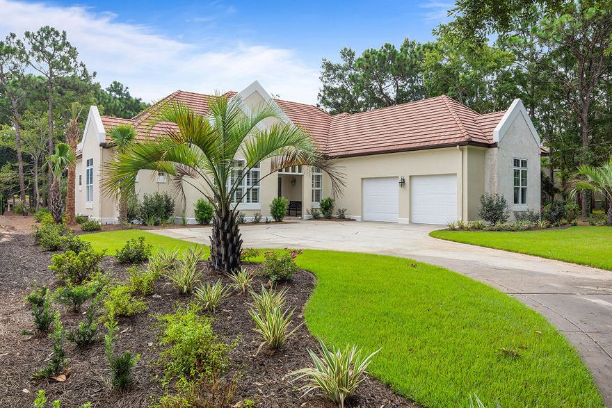 This beautifully designed 4 bedroom, 3 bath home is located in the prestigious gated community of Burnt Pine. The house has been completed remodeled and painted inside and out. The landscaping has been completely redone with the addition of 300 new plants and 9 palm trees. Natural light is abundant in the living room that has built-in bookshelves ,a gas log fireplace and a great view of the Burnt Pine Golf Course.