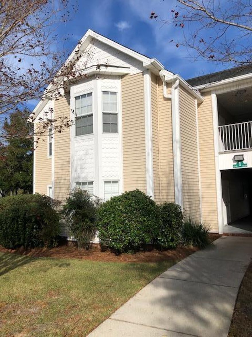 New plank flooring everywhere except bathroom that is tiled.  Freshly painted throughout.  Plantation Shutters. Undercabinet lighting in kitchen.  Convenient first floor unit steps away from parking.