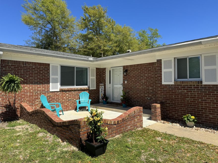 Central Niceville, large lot, and NO HOA! This updated home has 4 spacious bedrooms with 2.5 baths and is just minutes from schools, shopping, and local military bases! The kitchen features quartz countertops, recessed lighting, stainless steel appliances, and overlooks the living room with a wood burning fireplace. Off of the kitchen is the dining area as well as a second living room with endless possibilities! Down the hall the master bath has beautiful blue tile flooring and fresh white quartz countertops as well as a separate shower. The master bedroom has ample space to relax and a large closet.
