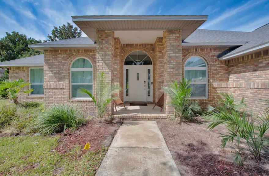 Experience Florida living at its finest in this impeccably renovated all-brick pool residence, gracefully situated within the prestigious Chevalier community. Fully functioning AirBnB with over $55,000 in profit in 2025! Thoughtfully redesigned with luxury flooring, designer lighting, stainless appliances, fresh interior finishes, and elegant linen drapery throughout, this home blends timeless style with modern comfort.The open, light-filled floor plan showcases soaring ceilings, multiple skylights, and a striking fireplace that anchors the main living space. The beautifully renovated kitchen offers abundant cabinetry and expansive counter space, ideal for both everyday living and entertaining. The spacious primary suite accommodates oversized furnishings and features a spa-inspired bath complete with an oversized tiled shower and jetted tub. A split-bedroom layout ensures privacy, with generously sized secondary bedrooms and a well-appointed Jack and Jill bath.

A climate-controlled sunroom adding substantial additional usable space provides endless versatility for a second living area, executive office, or recreation room. Outdoors, enjoy a sparkling inground pool, resurfaced deck, and a fully fenced private yard with irrigation system and storage shed. Recent upgrades include a 2020 roof, 2019 HVAC, hurricane-resistant windows, and updated electrical. Ideally located just minutes from Pensacola's renowned white-sand beaches and exceptional dining.