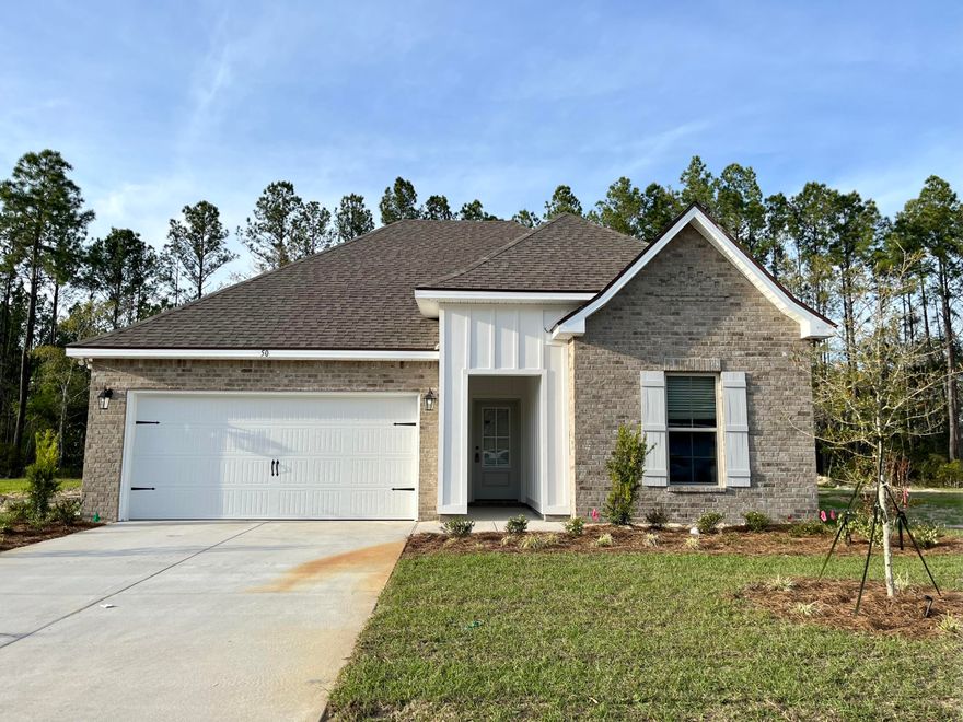 The TRILLIUM IV G in Moonswept at Hammock Bay community offers a 3 bedroom, 2 full bathroom, open design.  Upgrades added (list attached).  Features: double vanity, garden tub, separate custom tiled shower with frameless door, and walk-in closet in the master suite, master closet opens to laundry room, covered front and rear porches, crown molding, recessed lighting, kitchen island, walk-in pantry, undermount sinks, framed mirrors, smart connect Wi-Fi thermostat, smoke/carbon monoxide detectors, landscaping package, architectural 30-year shingles, flood lights, and more!Energy Efficient Features: water heater, kitchen appliance package with electric range, vinyl low E windows, and more!