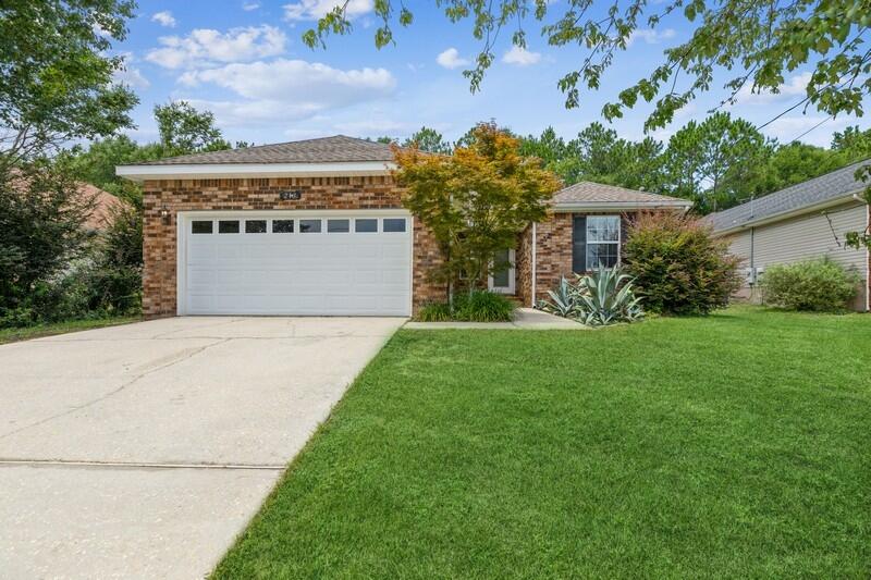 Welcome to Wildwood Gables located in central Crestview. This spacious 3 bedroom - 2 bathroom home has a beautiful brick front with vinyl on 3 sides. The home offers a split floor plan for privacy tat Buyers expect. Enjoy the all vaulted ceilings in the living room with fireplace and mantle that warm the home. The kitchen has all wood cabinets with refrigerator, smooth top range, microwave, dishwasher & disposal. A spacious tiled dining area is adjacent to the kitchen. Large master bedroom w/ trey ceiling and ensuite bathroom with double vanity & walk-in closet. The two additional bedroom are on the opposite side of the home separated by an additional full bathroom. Indoor laundry room next to the 2 car garage w/ pull down stairs and auto opener. Nicely landscaped front yard with