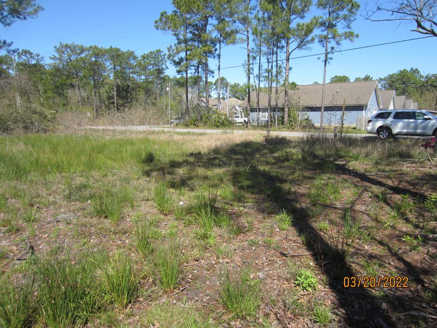 Cleared lot that is 50x125.  This lot has previously had a dwelling situated on it.  There is a well and septic system,  Public water & sewer are available.  The property is located in Flood Zone 'AE' with an elevation of approximately 5-7 feet.  The property is cleared with trees along 4th St.  Culvert will be needed.