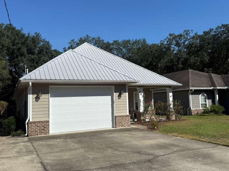 This move-in-ready home offers a stunning layout with 3 bedrooms, 2 bathrooms, and a dedicated office all on the main level, plus a versatile bonus room upstairs. Perfectly situated in the heart of Niceville, the location provides a convenient commute to local bases, beautiful beaches, and nearby shopping centers. From the moment you step inside, you'll feel right at home with its warm, inviting atmosphere and thoughtful upgrades throughout.The home features a split floor plan and a spacious kitchen with granite countertops, ample cabinet space, and a large island that opens to the living room, ideal for entertaining friends and family. The primary suite includes a massive walk-in closet with custom shelving and drawers, leading to a luxurious bathroom complete with double vanities, a walk-in shower, and a separate soaking tub.

The upstairs bonus room offers endless possibilities, whether you need a man cave, movie room, hobby space, or extra guest room. The oversized laundry room provides additional storage and counter space to make organizing and folding more convenient.

Out back, the fenced yard is perfect for children and pets to play safely, while the covered porch offers a relaxing spot to enjoy your morning coffee. Pets will be considered with prior owner approval and a non-refundable pet fee. Please note that no smoking or vaping is permitted.