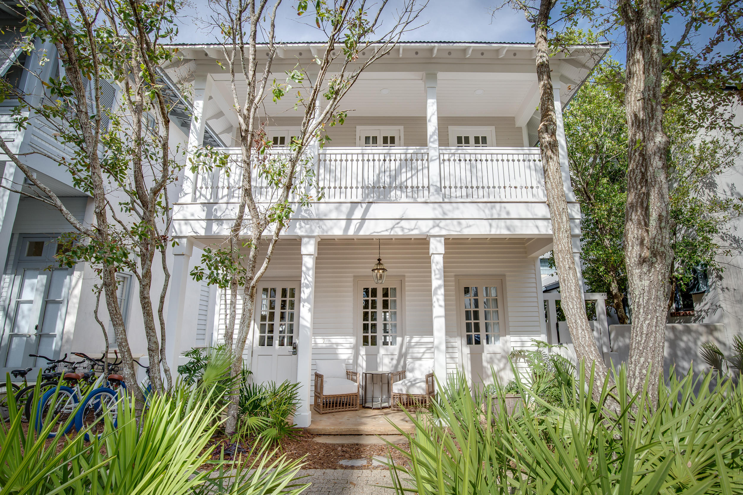 This beautifully updated light & bright home imparts a feeling of relaxation from the moment you walk in the door. A newly renovated kitchen opens to the dining area & connecting living room, complete with fireplace. Step outside to the courtyard & take a refreshing dip in the private pool or get cozy by the outdoor fireplace. An outdoor shower that connects to the first floor half bath allows you to rinse off after a day at the beach. On the second floor find the master bedroom & ensuite bath complete with a private porch. A second bedroom with two full sized beds, 2 built in hallway bunks & a full bath complete the upstairs. Across the courtyard & above the 2 car garage a carriage house with additional sleeping for 4, kitchenette and bathroom with adjoining outdoor shower awaits.