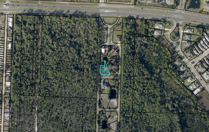 Exceptional lot in the exclusive gated community of Smugglers Cove. This prime location boasts deeded access to 66' of pristine waterfront and a sandy beach along the stunning intercostal waterway. Private community boat launch and dock, plus near all Navarre Beach has to offer, known for its sugar-white sands and emerald-green waters.