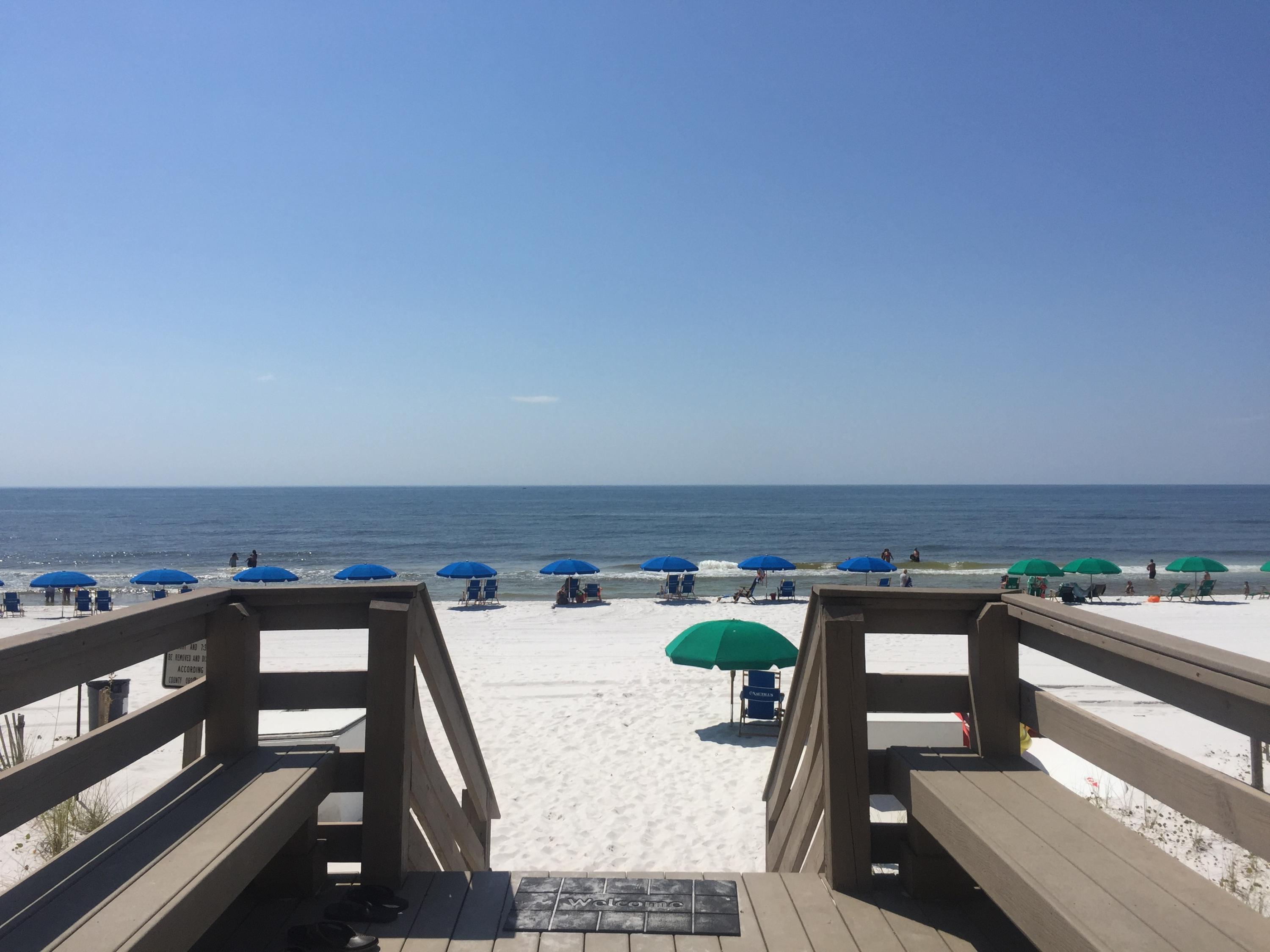 Beautiful 3 bedroom 2.5 bath condo directly on the gulf.This 1st floor unit creates privacy within your large balcony with the added convenience of the beach,the pool,& grill area just steps from your door. No waiting on elevators or taking stairs. The spaciousness of this condo would make for a great permanent or vacation home, but with the openness, and advantage of 3 bedrooms, its great rental potential is what investors desire. Newly decoarated with granite counters and glass mosaic backsplash tile in the kitchen plus beautiful travertine tile throughout. Freshly painted with the perfect color palette throughout for that relaxing beach feel. Glass shower doors installed in the bright and cheerful Master bedroom, which leads to the large patio for entertaining and enjoying the