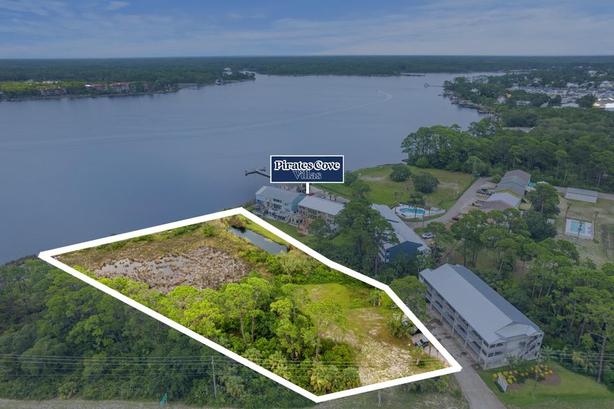 Now available for purchase is this 1.23 acre development site overlooking one of the area's premier Coastal Dune Lakes, Lake Powell. This property is easily accessible to the west end of Panama City Beach as well as a short drive to Santa Rosa Beach and the shopping and entertainment district, 30Avenue.Zoning of this property allows for residential uses up to 15 units/acre and a max building height of 230 feet. A broad range of commercial uses are also available for retail and professional services.