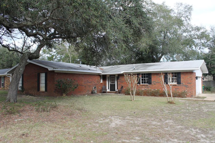 IMMEDIATE OCCUPANCY!!
This all brick 3/2 house is located on a large corner lot in a well established neighborhood near the bay in Niceville. The house has an oversized side-entry garage, an open living area floor plan and travertine tile floors throughout. The kitchen/dining area features granite counters, breakfast bar and stainless steel appliances and is situated between the two living areas where two french doors open to the covered back patio.
Call rental office today to schedule a viewing 850.389.8533