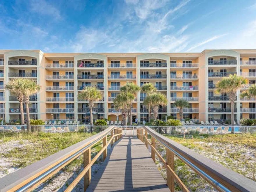 Experience breathtaking views of the pristine white sands and sparkling waters of the Gulf of Mexico from #317 at Azure on Okaloosa Island.   Located on the third level in the west-end stack, this exceptional Gulf front condo is the closest to the beach and offers stunning vistas from both the main living area and the master bedroom. The unit is situated away from the pool area, providing added privacy and tranquility. Also, this spacious layout includes an additional versatile flex room, perfect for use as a bunk room. Inside, you'll find large tile flooring throughout the main living spaces, elegant granite countertops, modern stainless steel appliances, high-grade millwork, and a professionally decorated interior. Recent upgrades include a replaced HVAC system and a dehumidifier for optimal comfort.    

 The exterior amenities are just as impressive, featuring gated and covered parking, a state-of-the-art fitness facility, two gulf-front pools and spas, a storage unit, lush landscaping, and a private boardwalk leading directly to the beach. This condo has never been part of a short-term rental program, making it ideal for personal use or as a luxury investment. All furniture, fixtures, and appliances convey, so it's move-in ready. Don't miss the opportunity to own this incredible Gulf front retreat at Azurecontact me today for more details!
