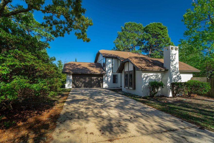 Its finally here! Tudor Style Home on a corner lot, it has several updates, extra space and fresh paint inside and out! This Beautiful 3 bedroom 2.5 bathroom home is located in Raintree estate,complete with a neighborhood park, beach and trails. You will love the two living rooms and the extra living space.  Kitchen is open to the family room and direct access to the back yard or relax in the oversized living room, both with fireplaces. The formal dining room, den or flex space will work for a multitude of needs.  There is a separate interior laundry room and half bath to complete the main floor.  Head upstairs to the private bedrooms and bathrooms. The Master bedroom has 2 closets and a simple ensuite.