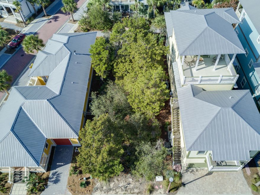 A truly unique home-site backing up to a Greenway Trail in the uber popular Seacrest Beach, located along famed 30-A! When you enter Seacrest Beach, you will be surrounded by quintessential Florida style architecture where you can build your dream home and start making memories at the beach today! Enjoy all Seacrest Beach has to offer including a huge lagoon style pool with fountain, private beach access approximately 300 yards away, daily seasonal beach tram service, and more. Renovations are in the process for a new pool concession cafe, expanded deck and seating, updated landscaping, and a redesign of the gazebo area. Do not miss out on these added features already taken care of at the seller's expense!