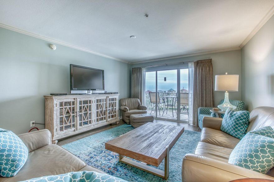 Stunning views of the Gulf and Amalfi Coast Resort from this top floor unit located in the highly desired C Building which directly faces the Gulf. It is the largest 2 bedroom plan in the complex featuring an open layout and oversized bedrooms. Professionally decorated with high end furnishings. The guest bedroom fits 2 queen size beds. The Master Bedroom faces the Gulf with a large walk in closet and a sliding glass door that leads to the balcony. Brand new hurricane shutters were added this past year. Amalfi is a gated, concrete and steel constructed development with a fitness center, 2 pools, one heated, two lighted tennis courts and clubhouse. This unit is being sold with a deeded garage parking space worth $25,000 and an interior storage cage. Sold completely furnished.