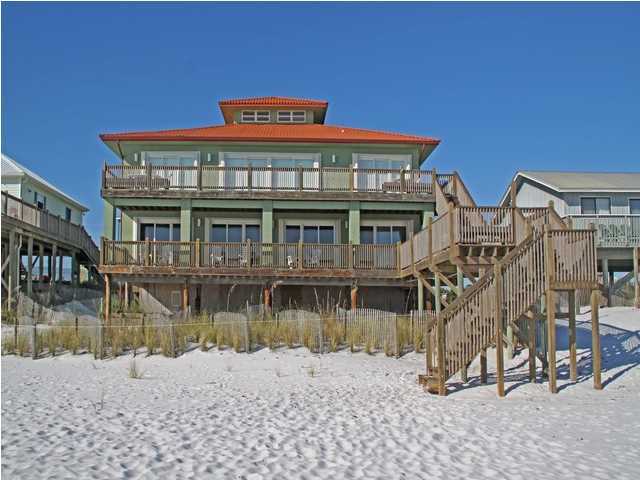 $200K PRICE REDUCTION, seller is extremely motivated and ready to sell! Gulf front, 3 story beach house is remarkably spacious, totally renovated inside and out, has 6 bedrooms, two kitchens and 2 laundry areas and can sleep up to 24 people. You have 78.2 feet of pristine Gulf front located on the West end of 30A on a sparsely populated, dune restored beach. The first floor offers 3 separate garages, two guest bedrooms, a very open family room, dining area and updated kitchen with window lined walls that bring the immense Gulf views inside. The kitchen features all stainless steel Kitchen-aide appliances, including a full refrigerator and a separate full freezer, breakfast bar, granite countertops, dishwasher and a micro wave/convection oven, all upgraded. There is a huge laundry