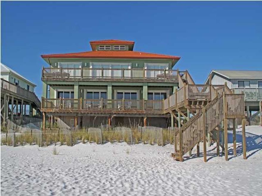 $200K PRICE REDUCTION, seller is extremely motivated and ready to sell! Gulf front, 3 story beach house is remarkably spacious, totally renovated inside and out, has 6 bedrooms, two kitchens and 2 laundry areas and can sleep up to 24 people. You have 78.2 feet of pristine Gulf front located on the West end of 30A on a sparsely populated, dune restored beach. The first floor offers 3 separate garages, two guest bedrooms, a very open family room, dining area and updated kitchen with window lined walls that bring the immense Gulf views inside. The kitchen features all stainless steel Kitchen-aide appliances, including a full refrigerator and a separate full freezer, breakfast bar, granite countertops, dishwasher and a micro wave/convection oven, all upgraded. There is a huge laundry