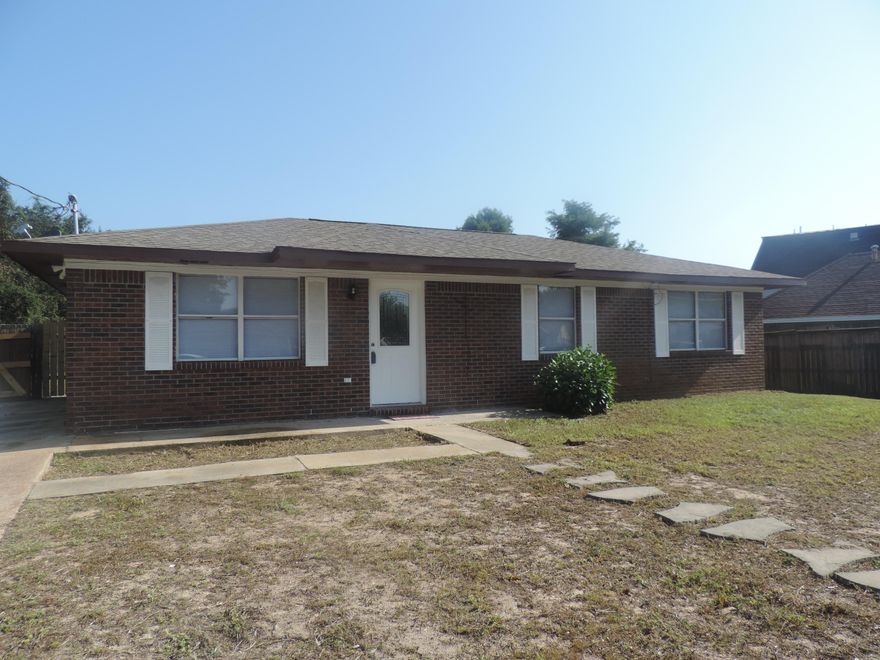 This would be a GREAT STARTER HOME for a young family! Located only 5 minutes from Hurlburt Field. ALL BRICK Home with Large Backyard that is privacy fenced. Home has been FRESHLY PAINTED INSIDE AND OUT! BRAND NEW STOVE! NO CARPET in this home - ALL TILE! Ready for you to move in!