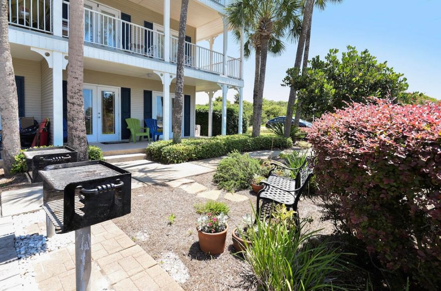 Welcome to this stunning 2 bedroom plus bunk beds condo at the Grand Caribbean in the heart of Crystal Beach. Step into a contemporary oasis boasting modern furnishings and an open layout that invites comfort and style. This tranquil condo is a corner unit which means an expansive, wrap-around patio, offering front-row seating to sunsets and the soothing sounds of waves. The owner's suite provides a serene escape with its attached private bathroom and king bed, while the second bedroom offers two queen beds and a quiet place to relax or watch tv.  This unit features a stackable washer and dryer AND built-in bunk beds. With its seamless integration of indoor and outdoor living, this condo's vibe is chill. The Grand Caribbean offers a pool, hot tub and beach access right across the street. The grounds are immaculately kept and you'll even get a storage unit to store your beach goodies.