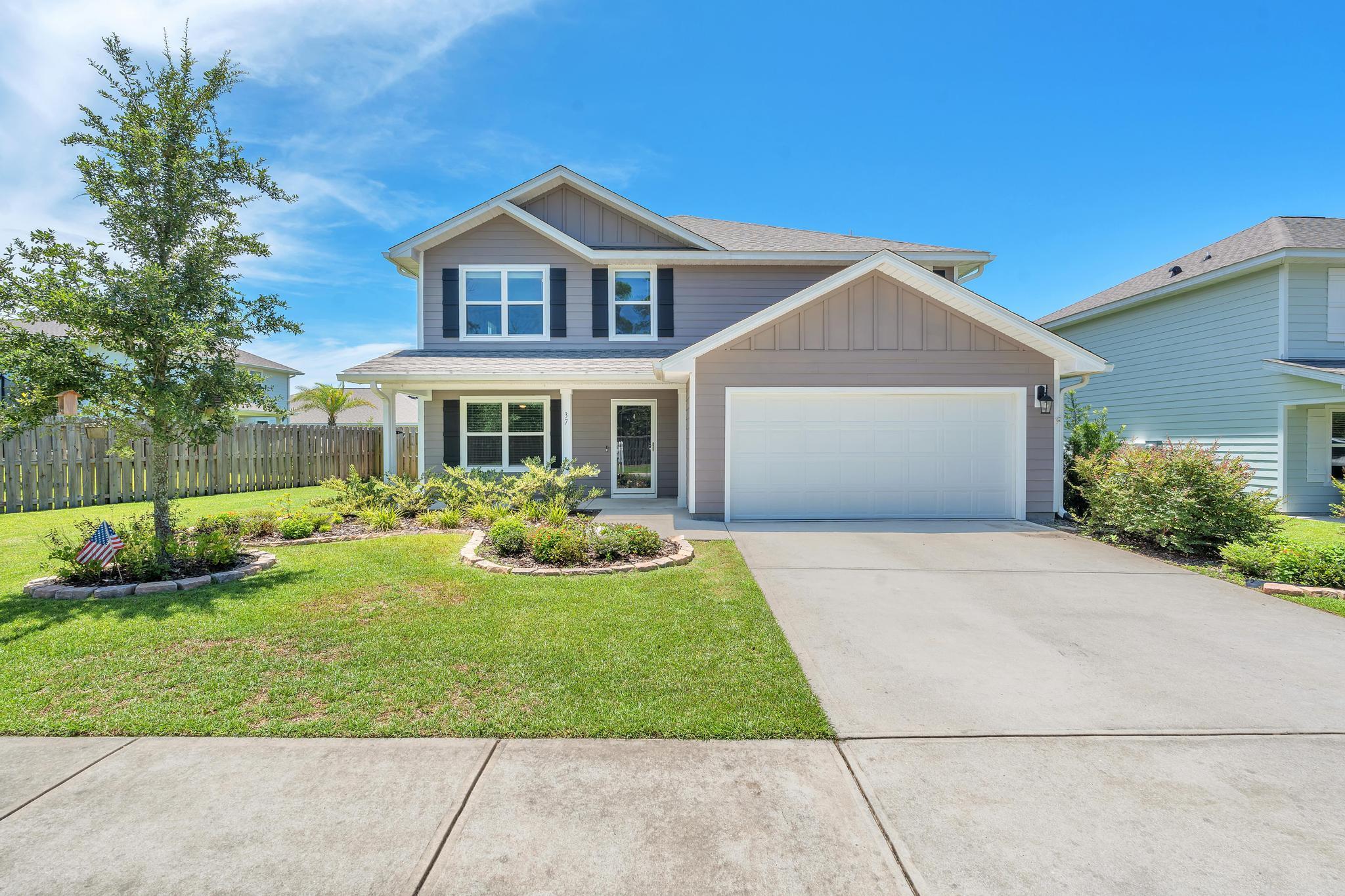 Welcome to this spacious 5-bedroom, 3-bathroom home located in desirable Hammock Bay!! This charming house features abundant curb appeal and a front porch perfect for enjoying your morning coffee. As you enter, you'll notice gorgeous LVP flooring and neutral walls that can accommodate almost any style of furnishings. Proceed to the living area & kitchen and you'll realize just how spacious/open this floor plan truly is. The kitchen features modern stainless steel appliances and an island for meal prep. The primary suite is located on the first floor with a large attached bathroom complete with shower AND garden tub for relaxing. Upstairs showcases a HUGE living/playroom & 4 large bedrooms. The Washer & Dryer are also located upstairs making laundry chores a breeze. Step outside to the large paver style patio with covered portion for additional shade. Amenities GALORE in Hammock Bay including: 2 resort style pools ; Tennis, Pickleball, and Basketball courts ; massive playground ; General Store. Call for your showing today!! Don't miss out on the opportunity to make this house your home!