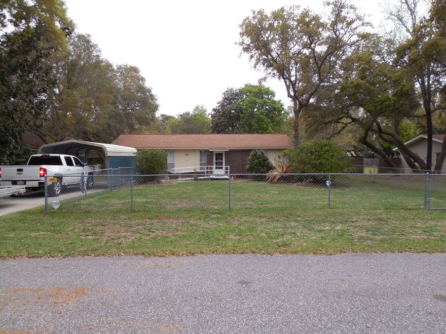 Cute Florida Cottage located in a quiet subdivision just east of Niceville in Choctaw Beach. This home has been well maintained and is handicap equipped. There is an aluminum ramp leading into the front door and 1 of the bathrooms has been fitted with a walk in tub with massage jets at $10,000 cost.The master bathroom has a walk in shower. The wall was taken out between 2 small bedrooms to make one large bedroom making this a 2 bedroom house. The roof is about 10 years old and was replaced with 30 year dimensional shingles. The HVAC was replaced 5 years ago with a Lennox high efficiency unit. The lot is completely fenced making it ideal for small children and pets.