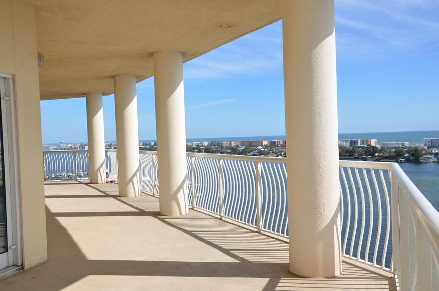 BOAT SLIP!  This newly renovated home boasts over 2,500 SF on the Santa Rosa Sound with magnificent views & sunsets.  The lower floors have 7 units per floor, but there are only 5 units on this floor.  Additionally, this larger middle unit has one of the biggest balconies offering a panoramic view.  It comes with 2 deeded parking spaces, large storage room, and the second largest boat slip that holds a 45' boat.  The unit has a large pantry, washer/dryer hookup, crown molding, solid surface kitchen counters, brand-new appliances, tray ceilings, new plank flooring, and more. The magnificent residential condominium Presidio features a heated pool, hot tub, fully-equipped fitness center, association room for parties & meetings, interior hallways to the units, media room for watching movies or ballgames with friends, 2 parking garages, decorative lobby, code-protected access to the building and parking garages, two elevators (one on either side of the building), outside barbeque grill, picnic tables, paddleboard storage, gated marina just minutes from the Gulf of Mexico, and a guest suite available to rent for guests for just a small cleaning fee.  Advantages of living in a condominium include security when travelling, social life with other owners, lower electric bills, all the amenities at a fraction of the cost, no more mowing the lawn or painting the house, and someone to call when there's a problem.  This unit has been owned by the current seller since it was built.  This unit has so many special features that you need not look any further.