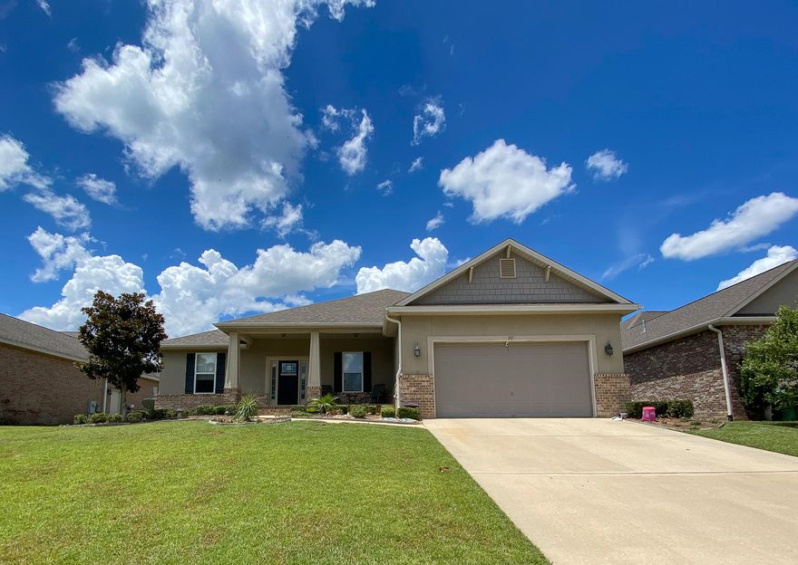 Welcome home to this 4 bedroom 3 full bathroom home with almost 2400 SF all on one level! This open floor plan with 9/10ft ceilings is great for entertaining and offers plenty of room for the whole family.  The kitchen features custom cabinets, granite countertops, a pantry, and a separate breakfast nook.  The spacious master bedroom features a tray ceiling and an ensuite with a dual vanity, garden tub with separate shower, and a walk-in closet. Two additional bedrooms are of ample size and share a Jack and Jill bath.  The fourth bedroom has a separate bathroom. French doors lead to a screened in lanai and a large yard with irrigation system. HVAC system was replaced with a $10,000 Lennox unit in 2016 and partial gutters were installed in 2015.
