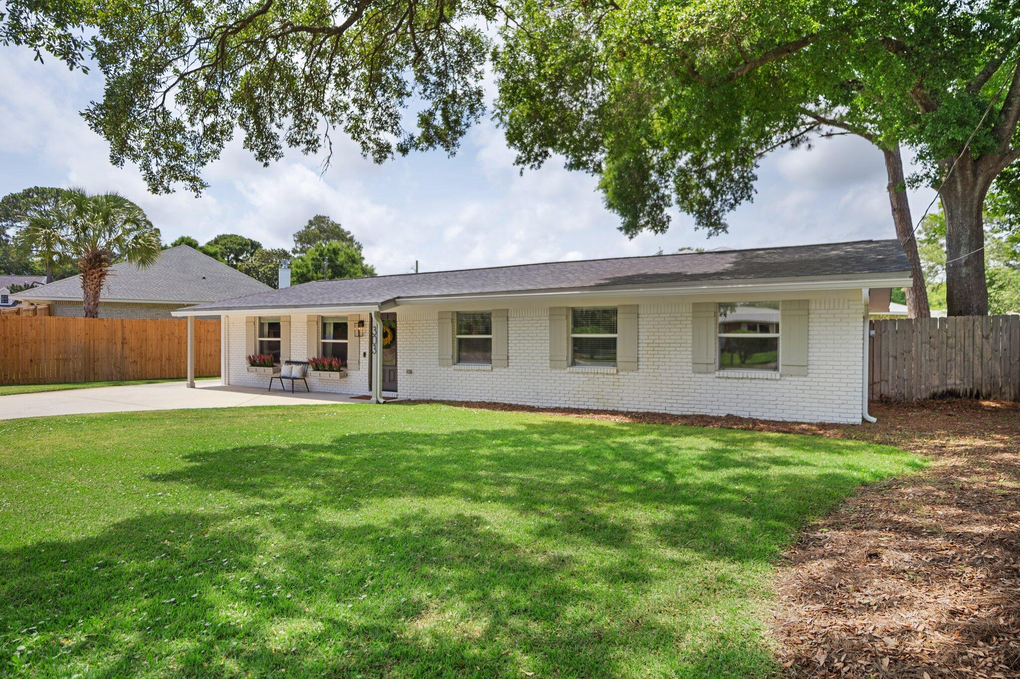 Welcome to this beautifully reimagined brick cottage in the heart of Fort Walton Beach's beloved Elliott Point neighborhood! This 4-bedroom, 2-bathroom home offers an ideal blend of modern updates and timeless charm. Upgraded features include double-pane insulated windows & doors, electrical panel, copper wiring, lighting, fixtures, freshy painted, gutters, HVAC, ductwork, 50 gallon water heater, and newer roof. Even the exterior shines with an additional boat/trailer pad, seamless gutters, irrigation, and a full 6-foot privacy fence. Inside, you'll fall in love with the open-concept layout and the inviting living room with exposed wood-beamed ceiling. Durable laminate flooring flows throughout, while the kitchen stuns with solid wood shaker cabinetry, quartz countertops---> and stylish fixtures.
This home is the total package! Modern comfort, quality craftsmanship, and unbeatable location. Schedule your private showing today before it's gone!