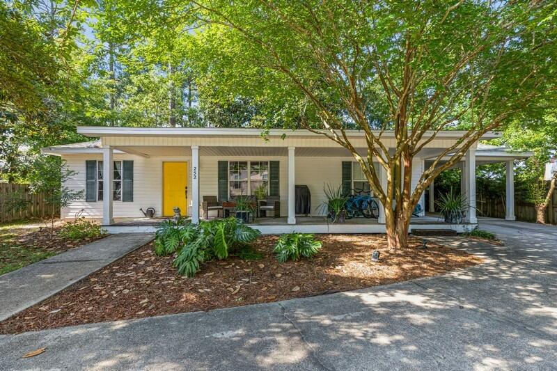 Must see, charming three bedroom and two full bath Florida cottage home. Most recent improvements include new shingle roof with two-year contractor warranty and a ten-year manufacturer warranty, new water heater, and air conditioning compressor. Recently installed granite in kitchen and bathrooms with new sinks and oil rubbed bronze finish faucets. Enjoy a large fully fenced yard that offers plenty of shade trees to relax on your grand front porch and cozy back deck area. This is also a proven income producing rental with previous rate of $1850 monthly. Palmetto Community offers many amenities such as community pool, picnic area, gazebo, and playground. It is conveniently located near beaches, bay, shopping, and restaurants. No short term rentals allowed. Call for showing.