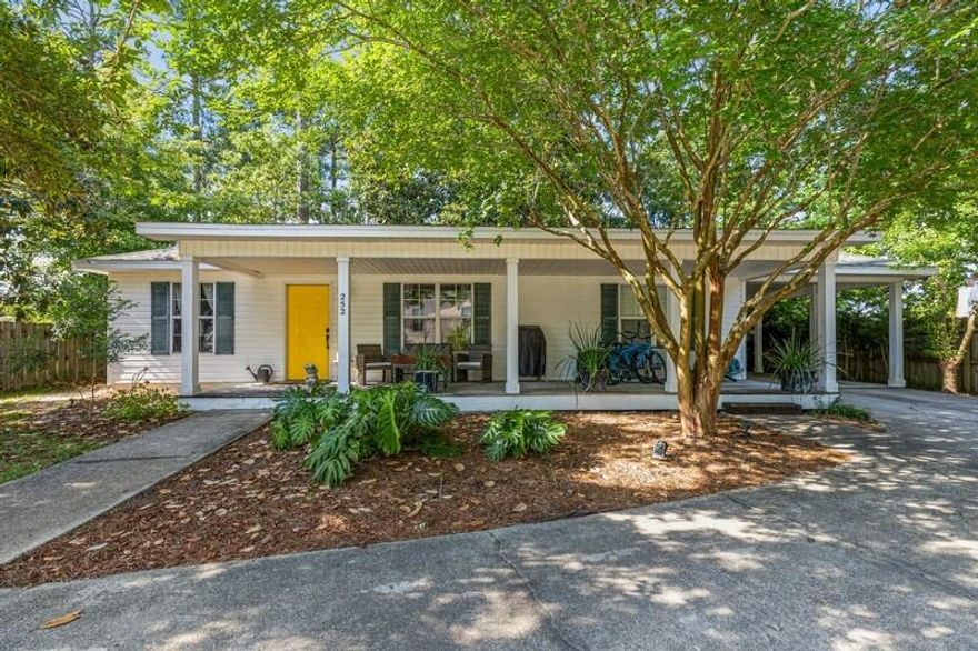 Must see, charming three bedroom and two full bath Florida cottage home. Most recent improvements include new shingle roof with two-year contractor warranty and a ten-year manufacturer warranty, new water heater, and air conditioning compressor.  Recently installed granite in kitchen and bathrooms with new sinks and oil rubbed bronze finish faucets.  Enjoy a large fully fenced yard that offers plenty of shade trees to relax on your grand front porch and cozy back deck area.  This is also a proven income producing rental with previous rate of $1850 monthly.  Palmetto Community offers many amenities such as community pool, picnic area, gazebo, and playground.  It is conveniently located near beaches, bay, shopping, and restaurants.  No short term rentals allowed.  Call for showing.