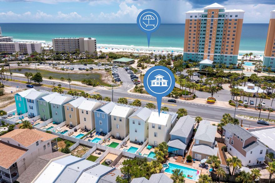 Located directly across Thomas Drive from Rick Seltzer Park, this 3-story, 4BR/3.5BA home offers prime access to one of PCB's most desirable beach entrances, with lifeguards, showers, parking, and Gulf views thanks to protected frontage. Sold fully furnished, it features $50K+ in upgrades, including new composite decking and roof section. The flexible layout includes multiple suites, loft, and a 3rd-floor entertainment space with vaulted ceilings, wet bar, sleeper sofa, and custom queen bunks. Main living offers 10' ceilings, tile floors, crown molding, fireplace, and natural light. Kitchen has granite, stainless appliances, wood cabinetry, breakfast bar, and pantry. Private fenced yard with heated saltwater pool and rooftop Gulf-view deck.