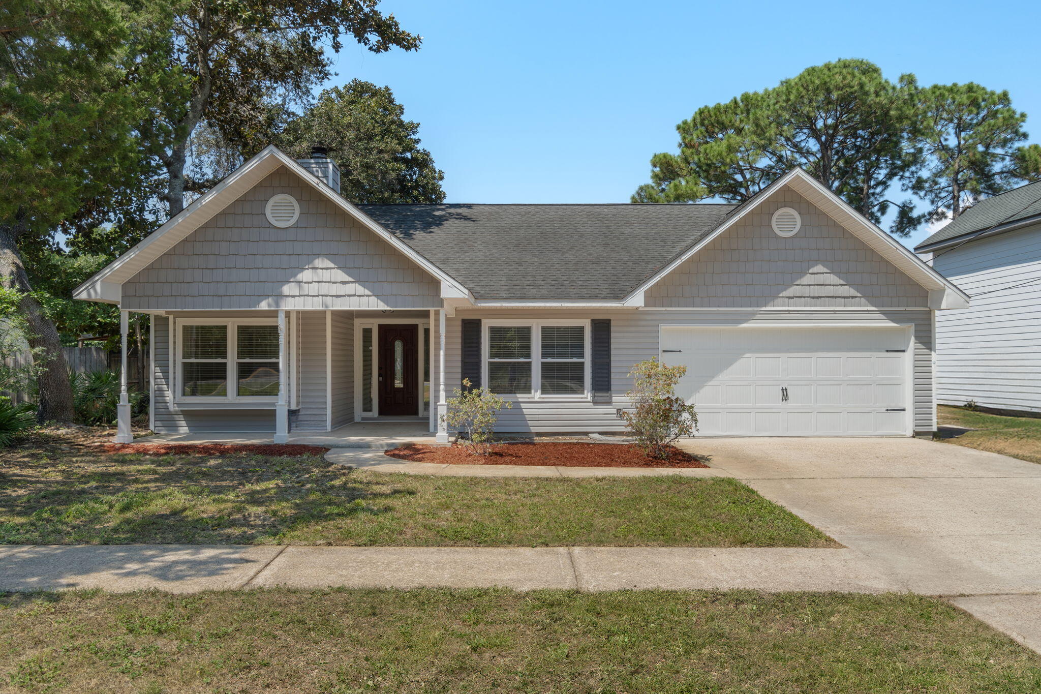 .4 Miles from Joes Bayou Boat Ramp!! This fully updated home is move-in ready and packed with desirable features inside and out. Recent upgrades include a new privacy fence, fresh interior paint, and brand-new carpet throughout.The kitchen is bright and welcoming, featuring skylights, stainless steel appliances, granite countertops, and plenty of cabinet space.The primary bathroom offers a luxurious retreat with dual vanities topped with marble, travertine tile surrounding a relaxing garden tub, and slate flooring.In the living room, you'll find a vaulted ceiling and a cozy fireplace, creating a spacious and inviting atmosphere for family and guests.Don't miss this beautifully refreshed home that blends comfort, style, and value