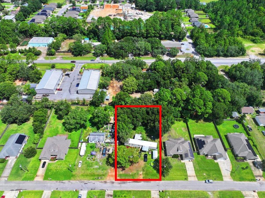 *PLEASE DO NOT GO THE PROPERTY WITHOUT AN APPOINTMENT. IT IS OCCUPIED BY A FAMILY* Located in a highly sought-after neighborhood in Navarre, FL, this large lot presents a fantastic opportunity for new construction or investment. Surrounded by homes that have historically sold for over $400,000, this property offers strong potential for future value growth.The lot currently features a 1992 mobile home and a 1994 garage, with full utilities hooked up and in livable condition. While these structures are not factored into the list price, they can either remain with the property or be removed by the seller based on buyer preference.Don't miss this chance to build your dream home or capitalize on a solid investment in one of Navarre's most desirable areas.