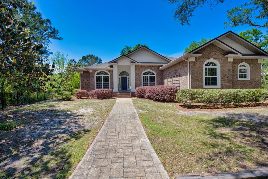 Amazing 4.6 (+/-) acre estate with over 300' of water frontage off of Mallet Bayou could be yours.  This beautiful home has 4 bdrms and 2 1/2 baths,  boasts of 12' ceilings as you enter into the home, 10' ceilings in other rooms throughout.  New carpet in all the bedrooms, freshly walls, ceilings and trim,  refinished wood flooring, new cabinets, under mount sinks, quartz countertops & faucets in the master bathroom, guest bathroom and one of the bedrooms that was used as a craft room. The master bath  has a walk-in shower, tiled surrounds &  tiled flooring that was renovated the latter part of 2021.  Kitchen was updated  a few years ago with granite countertops. Plenty of cabinets, stainless steel appliances &  a new GE Profile cooktop installed in 2024.