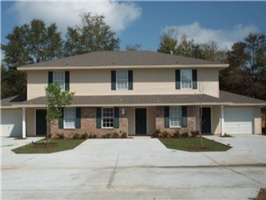 Great 2 bedroom unit in central Ft. Walton Beach. Perfect for small family or roommates! Nice end unit with garage! Open floor plan for kitchen/dining/living areas; half bath downstairs with separate laundry room; plenty of storage throughout - under stairs, off back patio; each bedroom has it's own private bath; yard service and pest control included. Enjoy a nice cook out on your shaded back patio. Sorry no pets. Available Now.