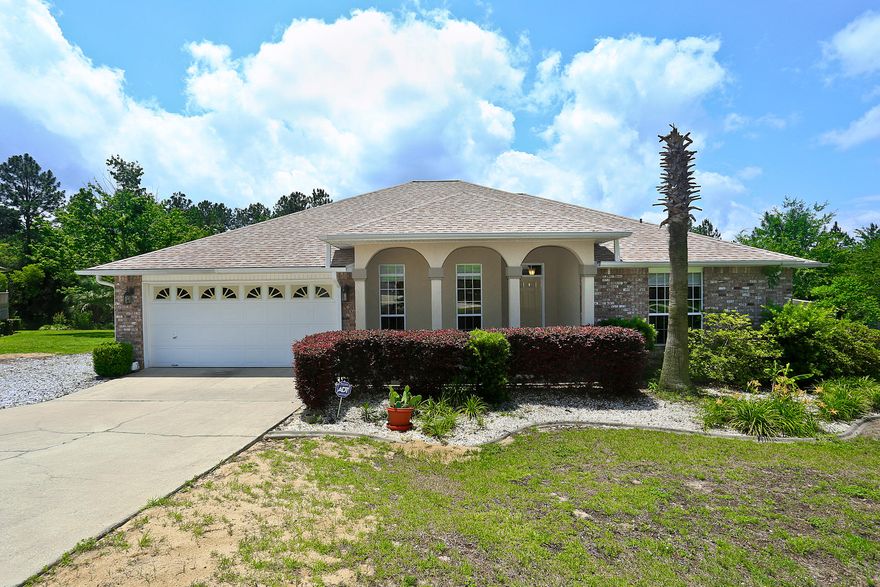 Beautifully upgraded home on a quiet cul-de-sac, in Southeast Crestview, South of I-10, off highly desirable Live Oak Church Road, area! This 3 bedroom, 2-1/2 baths home has a living area, dining area and an office that could be a 4th bedroom! This home has recently been updated with Bella Wood Floors, remodeled guest, hall and master bath with walk-in tiled shower and custom built cabinets. Roof, extra-large (24'x8') deck and stainless steel appliances were replaced in 2013. This brick home features 10 foot ceilings, security system and a romantic corner electric fireplace. A split bedroom design has a private entrance from master bedroom to the cover deck. Extra parking pad next to the double car garage. This home is located outside the city limits so NO CITY TAXES! Buyer to verify data.