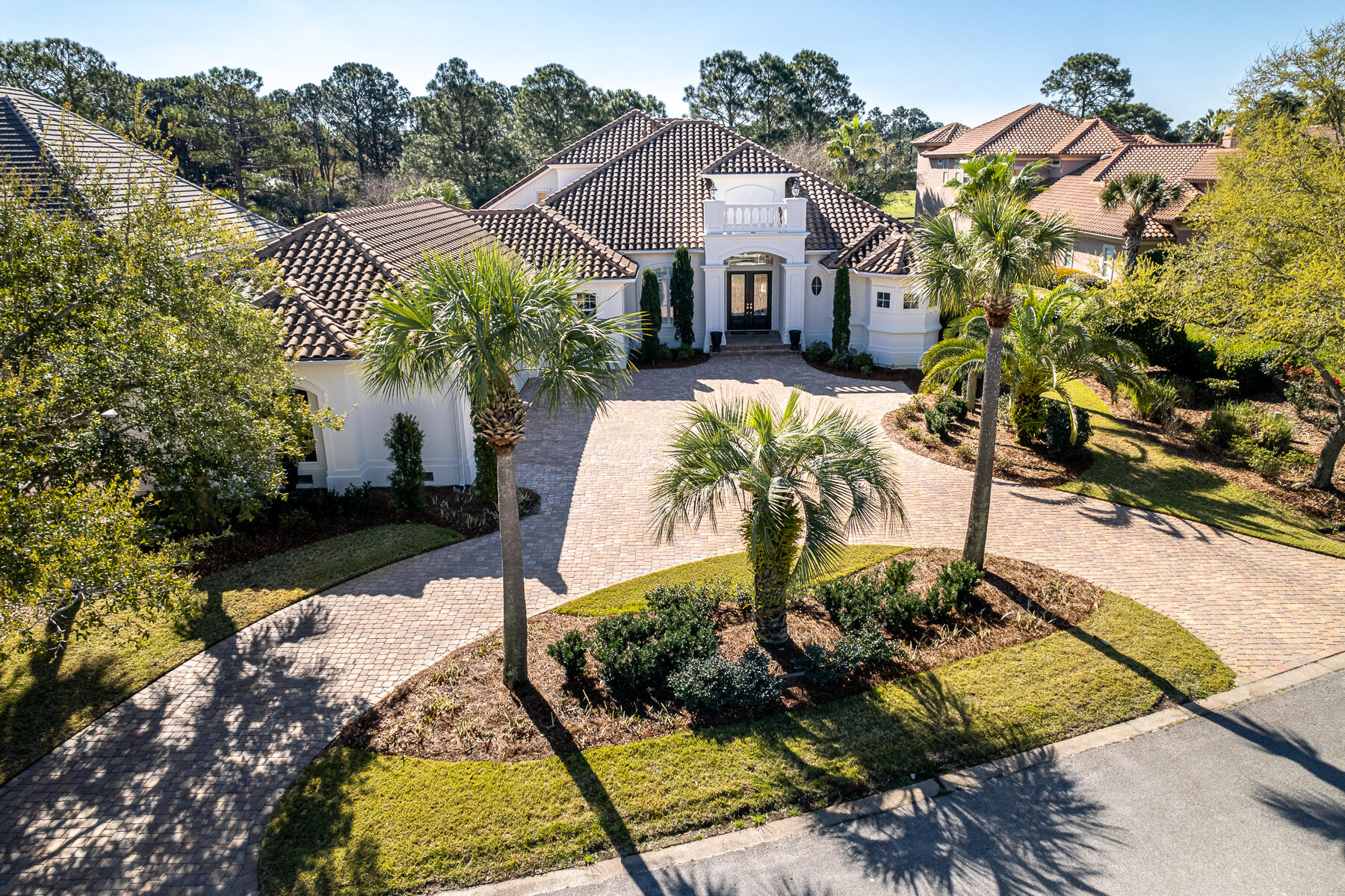 The epitome of luxury and beach living collide with this immaculate property in the prestigious gated community of Burnt Pine. Overlooking the 13th fairway, this home is situated on one of the most desirable streets in Sandestin. Measuring 4,885 square feet, 3237 Bay Estates features 4 bedrooms, 4.5 bathrooms, separate office with built-in desk and bookshelves, and large bonus room with ample storage. The state-of-the-art kitchen is complete with quartzite countertops, high-end stainless-steel appliances, a walk-in pantry, and an instant hot water system. The sizable Master Suite boasts his and her walk-in closets, custom floor-to-ceiling power drapes and elegant lighting.  The Master Bath consists of dual vanities, separate walk-in shower, and a custom, built-in hydrotherapy spa.