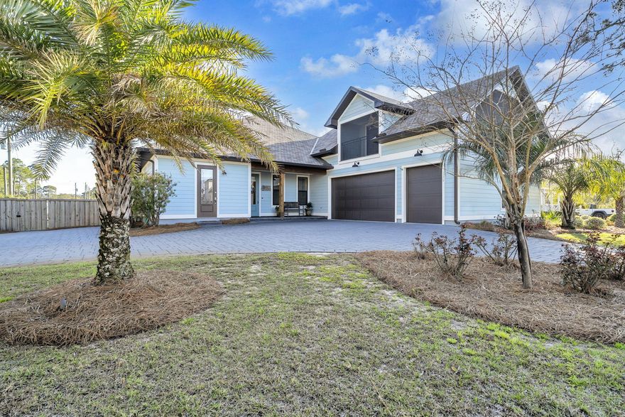 Local custom builder with outstanding reputation for quality built this beautiful home for his family.  One house back from the bay and set in a quiet family oriented neighborhood, this 2020 built southern property perfects living.  Huge great room open to kitchen with a long quartz center island and screened in porch makes a wonderful place for family and friends to gather and relax.  This fabulous gourmet kitchen with gas stove and double oven extends to a butler's pantry with fridge, sink and more cabinets and a big laundry room adjacent.  Hardwood floors throughout the rooms and living area along with solid core 8 ft interior doors dressed with sturdy brass door hardware offer luxury and durability to this home.  Each bedroom sports a bathroom with quartz counters and tiled floors. An upstair bonus room with pool table and fabulous porch with views of the bay make entertaining easy and fun.  The enormous outdoor space offers a paved firepit, golf putting green, outdoor shower and space for a large trailer or boat.  Pool table conveys with purchase.  