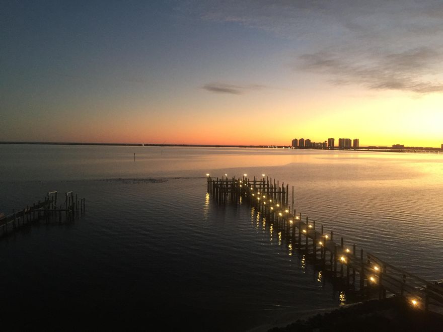 WATERFRONT living on the Santa Rosa Sound with unobstructed views of the gulf over Santa Rosa Island Military Reserve. Beautiful 3 bedroom, 3 bath condo with dock, water side pool, covered parking and elevator service. GATED community, that is fully landscaped, fire sprinkler and alarm system, water & sewer in the HOA fees. Building was finished in 2007 and complete refurbish and repaint of exterior completed in 2017. Tile and carpet floors and granite counters throughout. Stainless appliances, Kohler bath fixtures, owners lockout, and pantry with FULL size washer/dryer hookup. There are NO RENTAL RESTRICTIONS and the property is pet friendly to 20 lbs. All rentals since 2009 have been long term. Unit is directly above pool and looks out to dock and sound. Large balcony 8' deep.