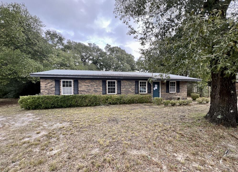 Built in 1978, this all brick REO home rests on 0.29 acres and comes with 4 bedrooms and 1 and 1/2  baths. Home has a metal roof and indoor laundry area. Lots of sweat equity options with this property! Due to repairs, home will not qualify for all financing types.