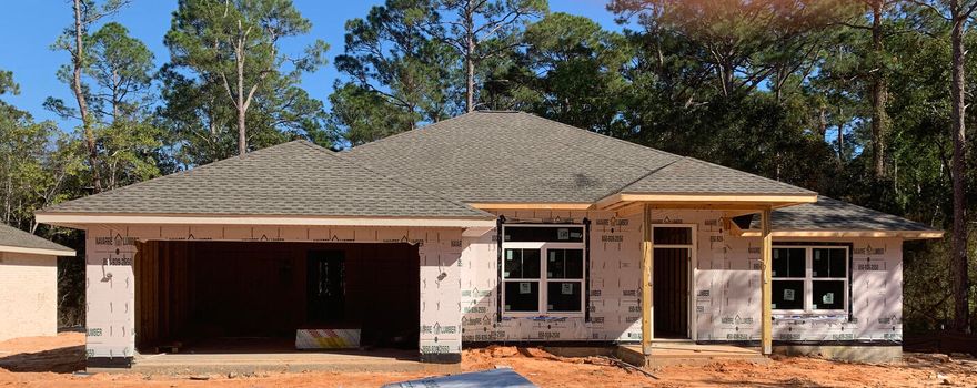 One of 5 NEW CRAFTSMAN Custom Built Homes under construction in West Navarre nestled on a tree lined no through road .This luxurious 4 bed/3 bath split floor plan is under construction...and will be ready in time for your  early 2022 move in .Short driving distance to Navarre Beach, shopping and Hwy 98 to Hurlburt Field AFB.This Stunning Robbins Builders Custom Home offers trend setting design & features~Greeted by a walk in foyer  with Formal Dining & sweeping through to your open floor plan ~Large Gourmet kitchen enjoying shaker cabinets with crown molding ~ beautiful granite counter tops~Under Mount Sink~S/S appliances huge walk in pantry~long sleek top island with open flow to the breakfast nook and family room