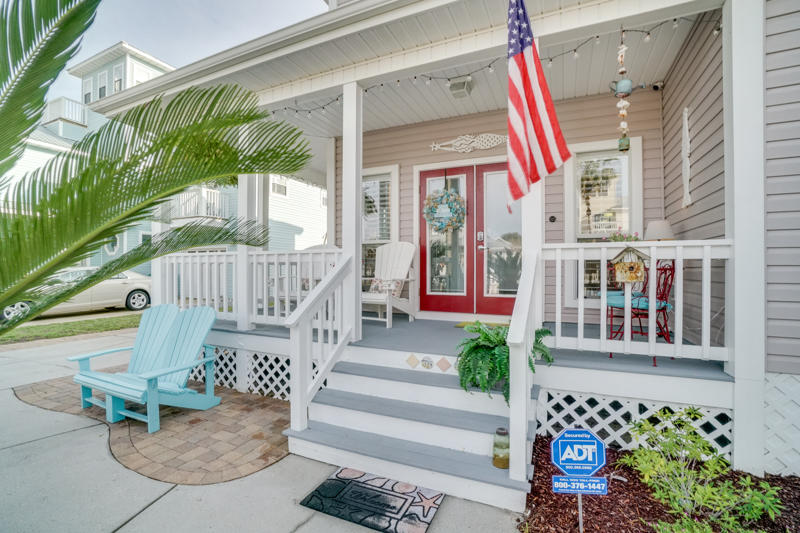 A quintessential beach house just one and half blocks to the beach is complete with a white picket fence in Crystal Beach Cottages...which conjures of images of sun splashed days biking and walking to the beach. Two bedrooms, a full bath, laundry room, and additional storage under the stairs make up the first floor of this amazing home. On the second floor, the master bedroom is accompanied by a large suite featuring a vaulted ceiling, double vanities, jetted tub, and walk-in shower. This home has never been rented, has a fully upgraded kitchen, golf cart parking, and more. Lushly and tropically landscaped exterior with a large deck for alfresco dining and entertaining.