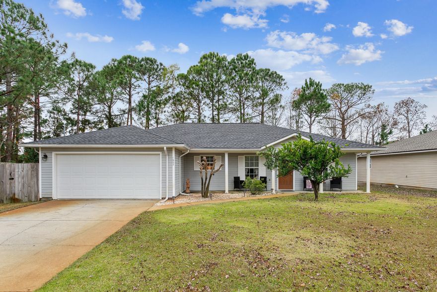 Presenting a meticulously maintained, move-in-ready, Gulf Breeze home, ideally situated between Navarre and Tiger Point. Enjoy the convenience and close proximity to A+ schools, shopping, restaurants, and a public boat launch. Step inside this charming 3-bedroom, 2-bathroom residence featuring a spacious open/split floor plan, thoughtfully designed for both comfort and functionality. The expansive 'Master' suite, offers dual walk-in closets, double vanities, a garden tub, a separate shower, and granite countertops. The kitchen boasts generous cabinet space, an oversized pantry, and a large island, seamlessly connecting to the living room that features a wood-burning fireplace. New French doors beckon you to the outdoor deck--a perfect space for entertaining or finding serenity. The fully fenced backyard is complete with a lawn pump and sprinkler system. Recent upgrades include a New roof (2021), New AC (2021) featuring an air purifier "Air Scrubber", all-new LVP flooring, and granite countertops in both the kitchen and bathrooms. Essential appliances we replaced in 2018, including the oven, dishwasher, and microwave. This home is not in an HOA which makes it perfect for, first-time home buyers, snow birds, investors, and everyone in-between! This is a must-see!