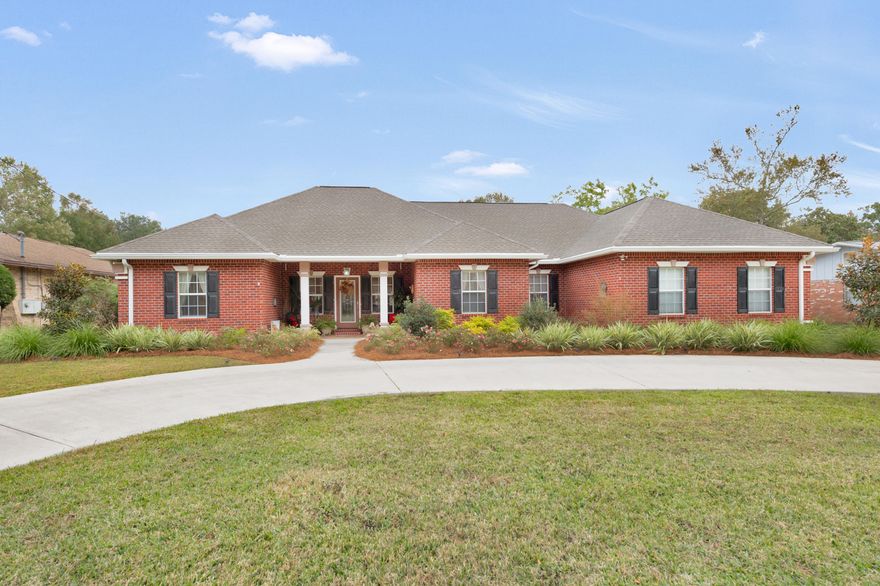 So much to say about this impressive home- immaculately maintained in the desirable Kenwood subdivision it has everything you are looking for including a screened in pool.Enter through the decorative glass front door into the main living area adorned with crown moulding, and finished with a gas fireplace.The spacious kitchen has all the cabinet and granite counter space you could want. A new dishwasher has just been installed. The eat-in kitchen offers a view of the backyard and pool. The formal dining area with a lighted trey ceiling is directly off of the bonus room.There is no end to the storage space in this home. A large walk-in with shelving is right off the laundry room. Plus, a heated/cooled room above the garage is large enough to serve as a workshop.