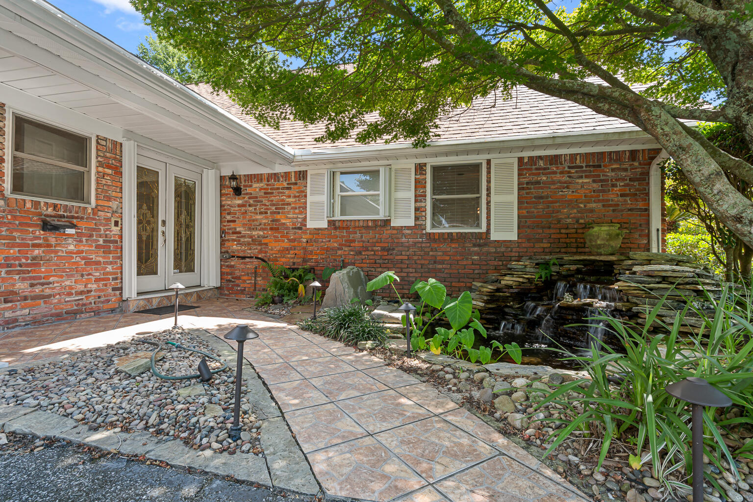 Beautifully Updated 5-Bedroom, 3-Bath Home with Bonus Room - No HOA - Poquito Bayou Neighborhood! Discover the perfect blend of space, functionality, and modern updates in this thoughtfully maintained two-story home. Situated on a 0.34-acre lot in the highly desirable Poquito Bayou neighborhood, this property offers no HOA fees and is just minutes from Eglin AFB, Hurlburt Field, Fort Walton Beach, and local beaches. A gorgeous koi pond and waterfall welcome you at the entry, setting the tone for the tranquility found throughout the home. Step inside to find five spacious bedrooms, three full bathrooms, and three versatile living areas, including a bonus room with a private entrance--ideal for a home business, studio, extra entertaining space, game room, or guest suite. The 5th bedroom is large enough to serve as a spacious walk-in closet, and the upstairs level could easily function as a complete master suite with a spacious bedroom, walk-in closet, and updated bath. The home features fresh interior paint, new luxury vinyl plank flooring, and updated interior doors and lighting throughout. The kitchen is equipped with double ovens, a gas range, ample cabinet storage, and space for a second refrigerator, while a walk-in pantry adds convenience. Recent upgrades (2023-2025) include a brand-new roof, copper wiring (March 2024), water heater, lawn irrigation pump, and updated baths with the downstairs en suite renovated in 2023 and the upstairs bath completed in May 2025. Double-pane vinyl windows, a zoned high-efficiency HVAC system, and a whole-house Generac gas generator provides year-round comfort and security. The first-floor primary suite showcases a tiled walk-in shower, while the guest bath offers an oversized granite-topped vanity and tub/shower combo. Upstairs, a spacious bedroom with a walk-in closet and updated bath provides additional privacy and flexibility. The interior laundry room includes a utility sink, folding table, and space for another refrigerator. Outside, enjoy a meticulously landscaped yard, two powered storage sheds/workshops, and an oversized driveway for multiple vehicles. Nearby you'll also find a boat ramp and a playground, adding to the convenience of this location. This home offers unmatched flexibility, thoughtful upgrades, and a sought-after location, ready for its next chapter! *Some photos have been virtually staged*
