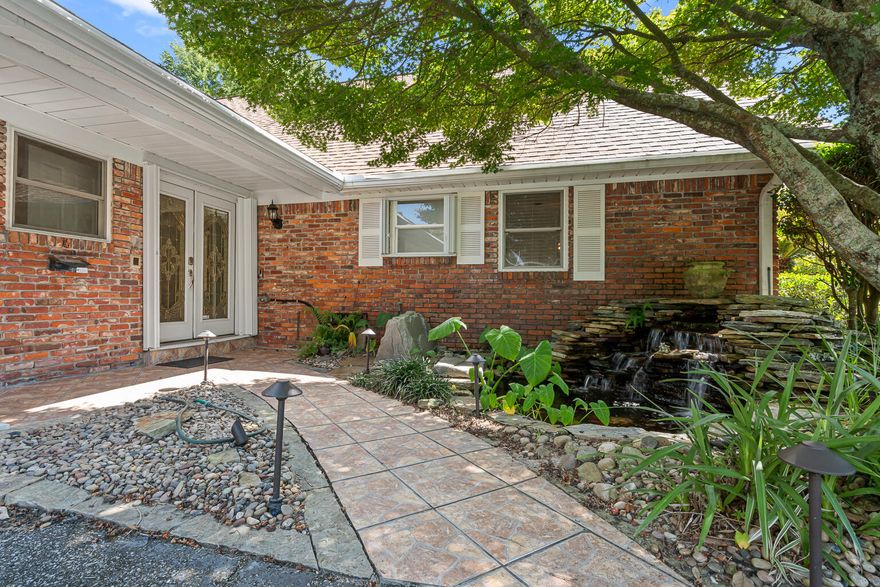 Beautifully Updated 5-Bedroom, 3-Bath Home with Bonus Room - No HOA - Poquito Bayou Neighborhood! Discover the perfect blend of space, functionality, and modern updates in this thoughtfully maintained two-story home. Situated on a 0.34-acre lot in the highly desirable Poquito Bayou neighborhood, this property offers no HOA fees and is just minutes from Eglin AFB, Hurlburt Field, Fort Walton Beach, and local beaches. A gorgeous koi pond and waterfall welcome you at the entry, setting the tone for the tranquility found throughout the home. Step inside to find five spacious bedrooms, three full bathrooms, and three versatile living areas, including a bonus room with a private entrance--ideal for a home business, studio, extra entertaining space, game room, or guest suite. The 5th bedroom is large enough to serve as a spacious walk-in closet, and the upstairs level could easily function as a complete master suite with a spacious bedroom, walk-in closet, and updated bath. The home features fresh interior paint, new luxury vinyl plank flooring, and updated interior doors and lighting throughout. The kitchen is equipped with double ovens, a gas range, ample cabinet storage, and space for a second refrigerator, while a walk-in pantry adds convenience. Recent upgrades (2023-2025) include a brand-new roof, copper wiring (March 2024), water heater, lawn irrigation pump, and updated baths with the downstairs en suite renovated in 2023 and the upstairs bath completed in May 2025. Double-pane vinyl windows, a zoned high-efficiency HVAC system, and a whole-house Generac gas generator provides year-round comfort and security. The first-floor primary suite showcases a tiled walk-in shower, while the guest bath offers an oversized granite-topped vanity and tub/shower combo. Upstairs, a spacious bedroom with a walk-in closet and updated bath provides additional privacy and flexibility. The interior laundry room includes a utility sink, folding table, and space for another refrigerator. Outside, enjoy a meticulously landscaped yard, two powered storage sheds/workshops, and an oversized driveway for multiple vehicles. Nearby you'll also find a boat ramp and a playground, adding to the convenience of this location. This home offers unmatched flexibility, thoughtful upgrades, and a sought-after location, ready for its next chapter! *Some photos have been virtually staged*