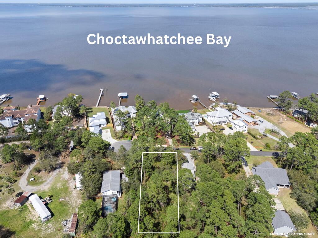 BUILD your DREAM home on this stunning 0.51-acre lot boasting captivating bay views! Situated in the sought-after Bay Pine Shores subdivision, mere minutes from the pristine 30A beaches, Cessna Boat Ramp, Kellogg Park, dining, shopping, the vibrant entertainment scene of Santa Rosa Beach & in the works 10,000 seat amphitheater with walking trails just up the road! Your dream lifestyle awaits! Survey Available. No wetlands. Buyer to verify all information.