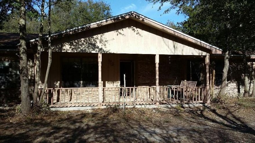 A house you just need to see. It needs lots of tlc but the bones are good.It had new roof after storms in 2005 Itmay have one leak in bathroom If you need a project or want a flip home this home is waiting for your hammer and tools. Dont miss this nice looking house and totally fenced in .43 acres. You can see bay from side yard. Please verify schools and room sizes and anything else that is important to you.
