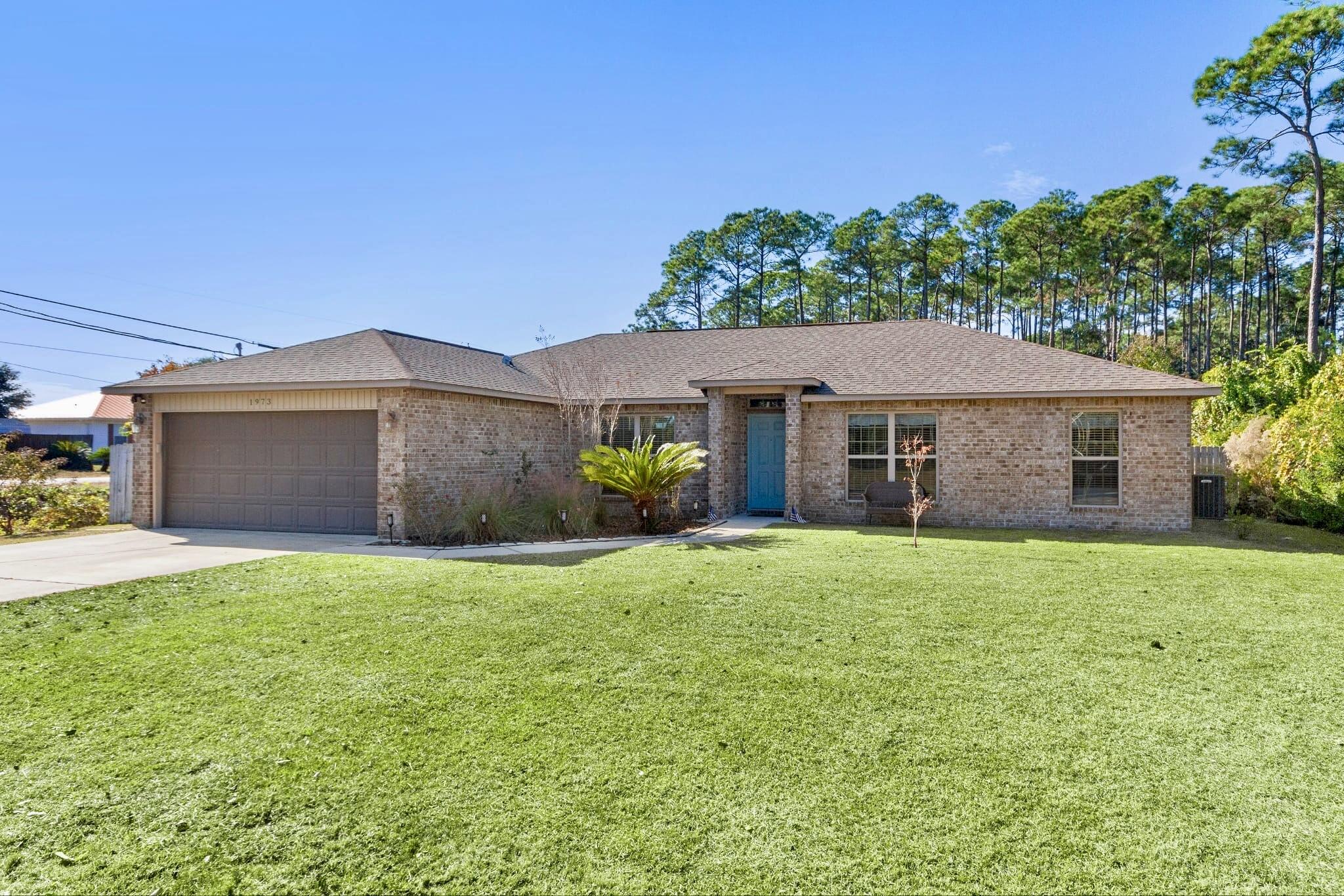 Beautifully maintained 4BR/2BA home in the heart of Navarre offering comfort, style, and convenience with NO HOA. The bright, airy kitchen showcases white cabinets, clean lines, and granite counters, opening to a cozy split floor plan with durable vinyl flooring and plush carpet in bedrooms. Currently a successful themed Airbnb, this property is ideal as a turnkey investment or move-in ready home. Outdoor living shines with nearly a half acre lot, an above-ground pool, swing set, patio and pavilion with a recently installed privacy fence. Perfectly located near Navarre's sugar-white beaches, I-10, shopping, dining, and Hurlburt Field, this meticulously kept home offers a rare combination of lifestyle, income potential, and location.