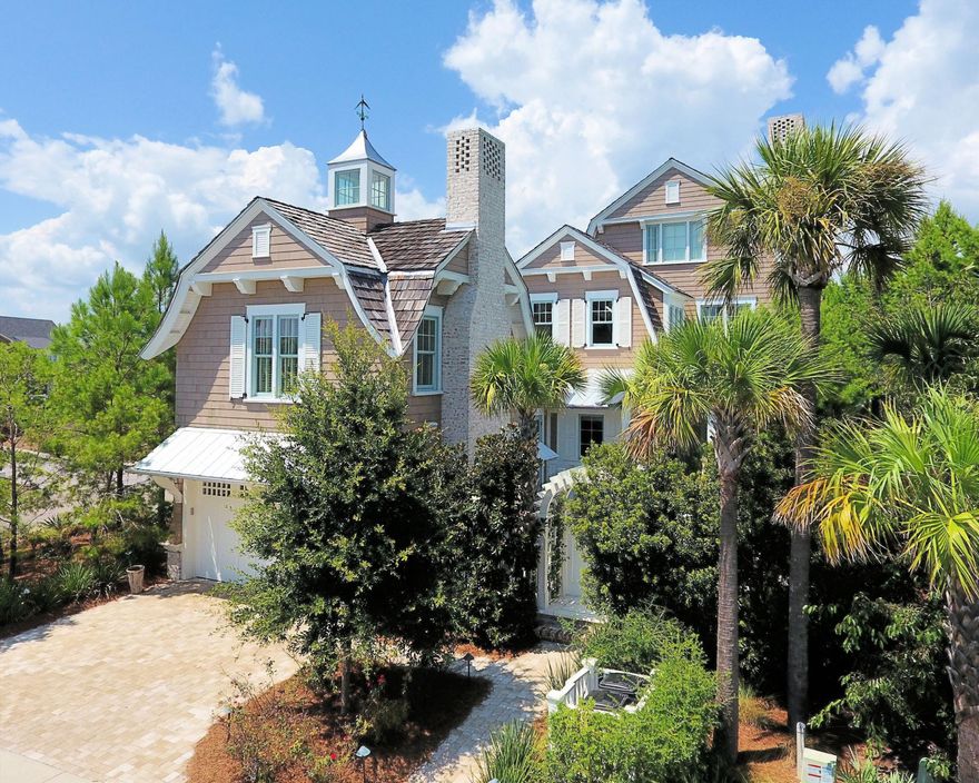 REDUCED $200,000. High End Finish Levels at this price point and price/sqft should not be missed. Featured in Elegant Home Magazine, Architect T. S. Adams designed the shingle styled home to create an amazing, window-filled, two story homeowner's dream. The home is surrounded on a corner lot with pine trees, magnolias and palm trees to create a private retreat within walking distance to Gulf of Mexico. There are four bedrooms with the potential for a large fifth bedroom; 4.5 baths, heated floors, antique beams, reclaimed white washed oak floors; shiplap and high end wood trim throughout every room. The three story grand staircase is the focal point of the first floor. Home has soaring ceilings with arched beams. It will take your breathe away. Seller will entertain selling some of the furnishings that coordinate with the home. The entry patio can accommodate a pool or water feature next to the completely equipped Viking outdoor kitchen and gas fireplace.

WaterSound amenities include neighborhood pools, clubhouse, fitness center, foot paths, dune walk overs to the beach and a post office.  As an owner, additional amenities are available through the purchase of one of three St. Joe Club & Resort memberships.  Click on documents for add'l info.  Buyers fee of .5% or purchase price payable to St. Joe Community Fnd and .5% of purchase price payable to WaterSound HOA at closing.