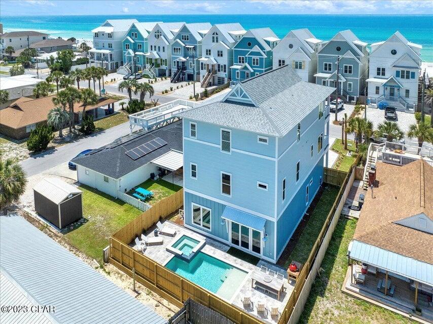 New Construction, this 7 bedroom, 7 bath with a rec room is designed to be a rental machine and sleeps 24. just footsteps away from the Gulf. This Beach house is designed to maximize your rental income with plenty of break out areas for your guest and a pool and outdoor cooking area as well. The house is fully furnished and already on rental with Ben's Beach Homes.